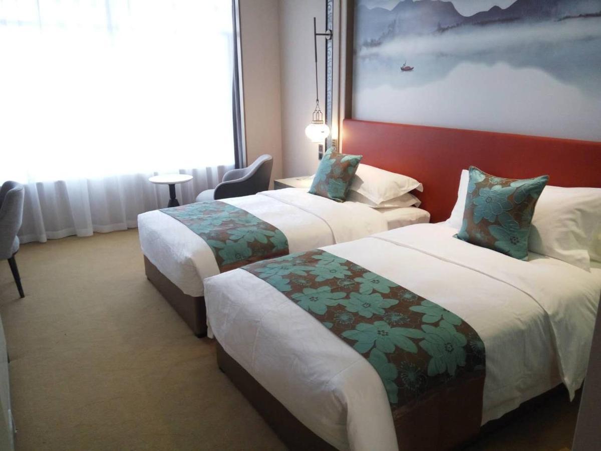 Weiselect Wanghu Hotel Куньмин Экстерьер фото